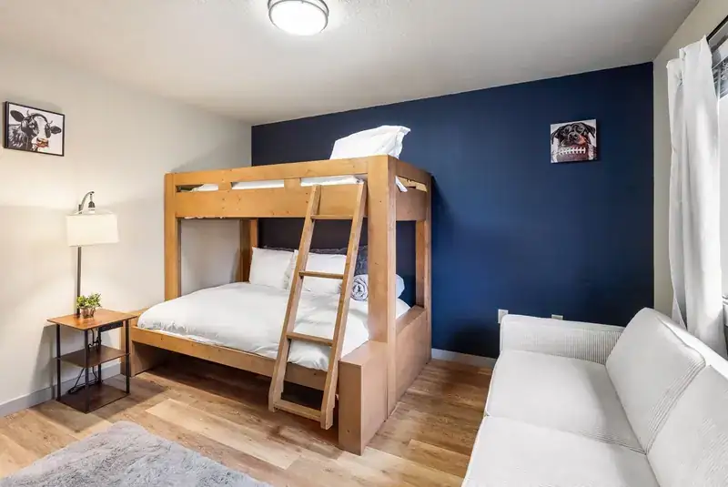 Entire duplex: Bedroom with bunk bed and sofa