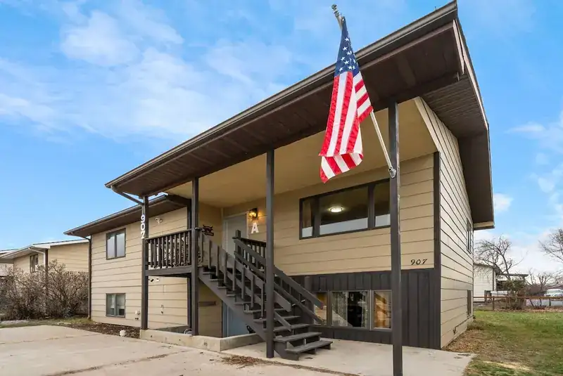Modern Mountainview A: Duplex exterior with upper deck and stairs
