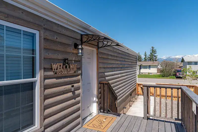 Sky 3BR Lodge: Front deck and entry of the home