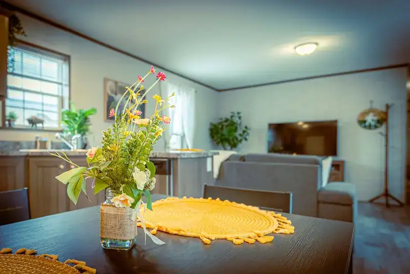 Sky 3BR Lodge: Dining table looking into living room